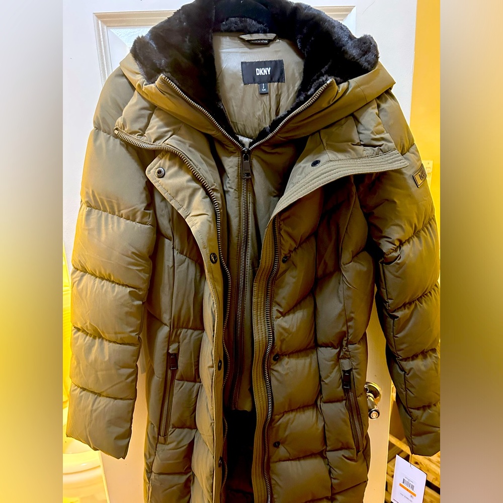 DKNY women’s long puffer , bib front , faux fur trim , hood, with tags!